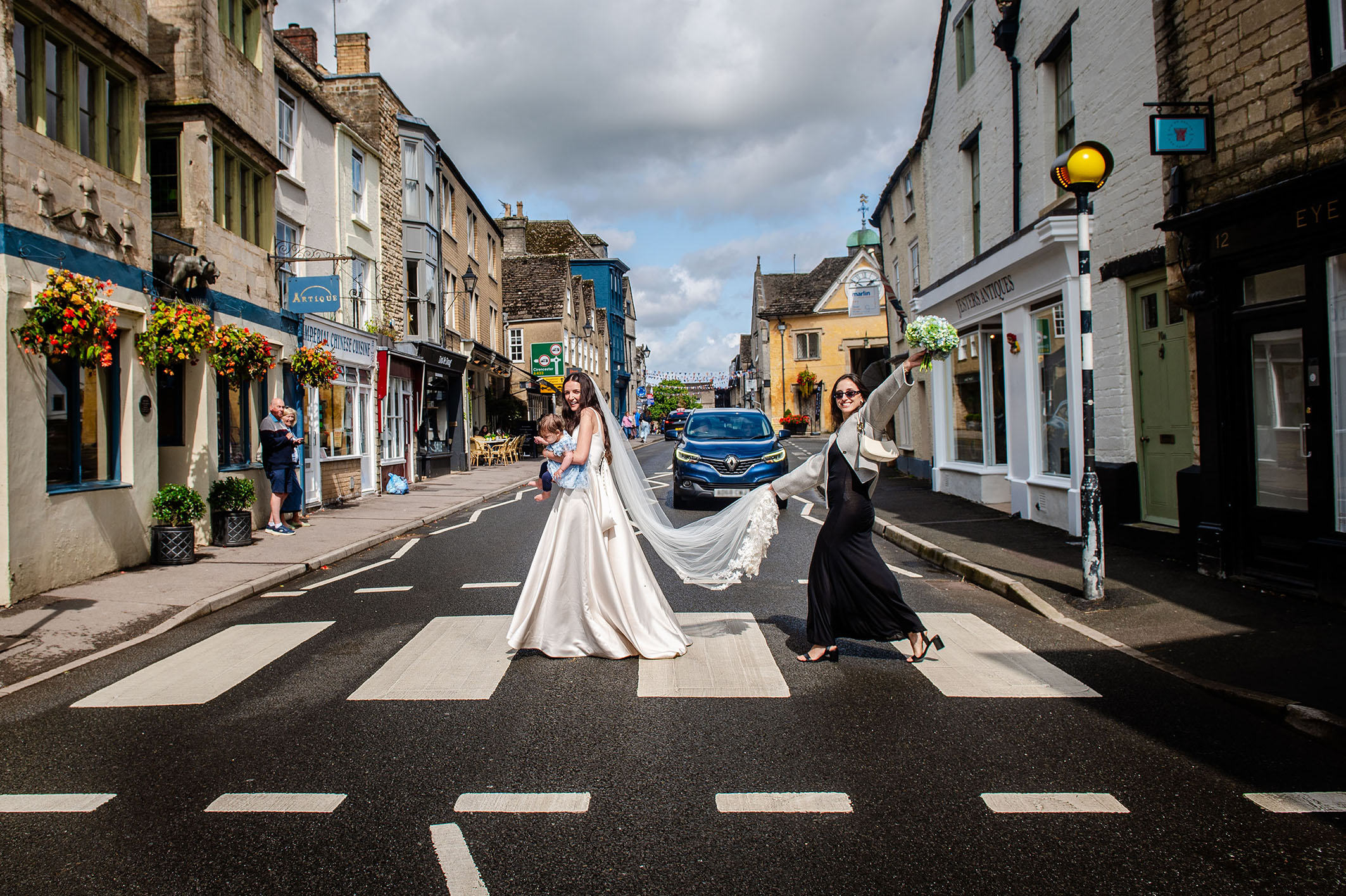 Wedding photography bride zebra crossing fun-bridesmaid tetbury gloucestershire